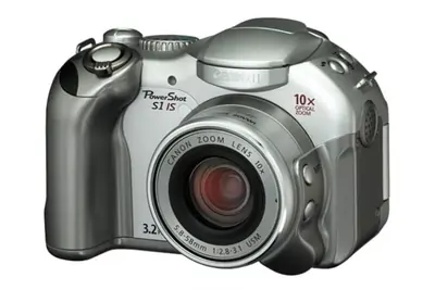 <b><big>CANON POWERSHOT S1 IS</big></b>
							 <p style='text-align:justify'>
								De Canon PowerShot S1 IS is een digitale zoom camera (10x optische zoom), met een 3.2 megapixel CCD-sensor en de eerste generatie DIGIC processor.
								De krachtige lens met 10x optische zoom is uitgerust met de befaamde optische beeldstabilisatie die bewogen foto's voorkomt.
								Met de USM (Ultrasonic Motor) kan snel en vrijwel geruisloos gewerkt worden.
							 </p>
							 <!-- LINK TOEVOEGEN IN OMSCHRIJVING -->
							 <small><i>
								<span class='w3-text-gray'>
									meer informatie:
								</span>
								<span class='w3-hover-text-teal'>
									<a href='https://www.dpreview.com/reviews/canons1is' target='_blank'>DPReview - Canon PowerShot S5 IS <i class='fas fa-external-link-alt fa-fw'></i></a>
								</span>
							</i></small>